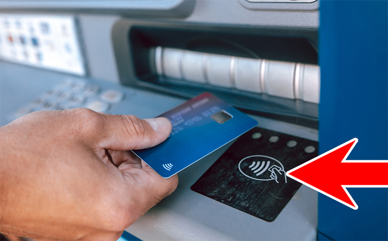 Picture Of Someone At An Atm With A Red Arrow Pointing To The Nfc Icon.